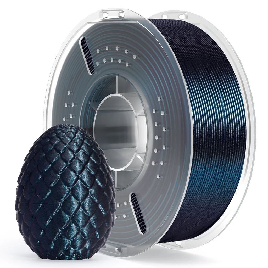 Spool of dark blue 3D printing filament with a printed object on a white background