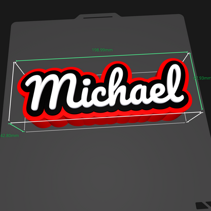 A 3D digital rendering of a custom name decal spelling 'Michael' in white script with a black outline and red shadow, shown with green dimension lines on a dark gray background.